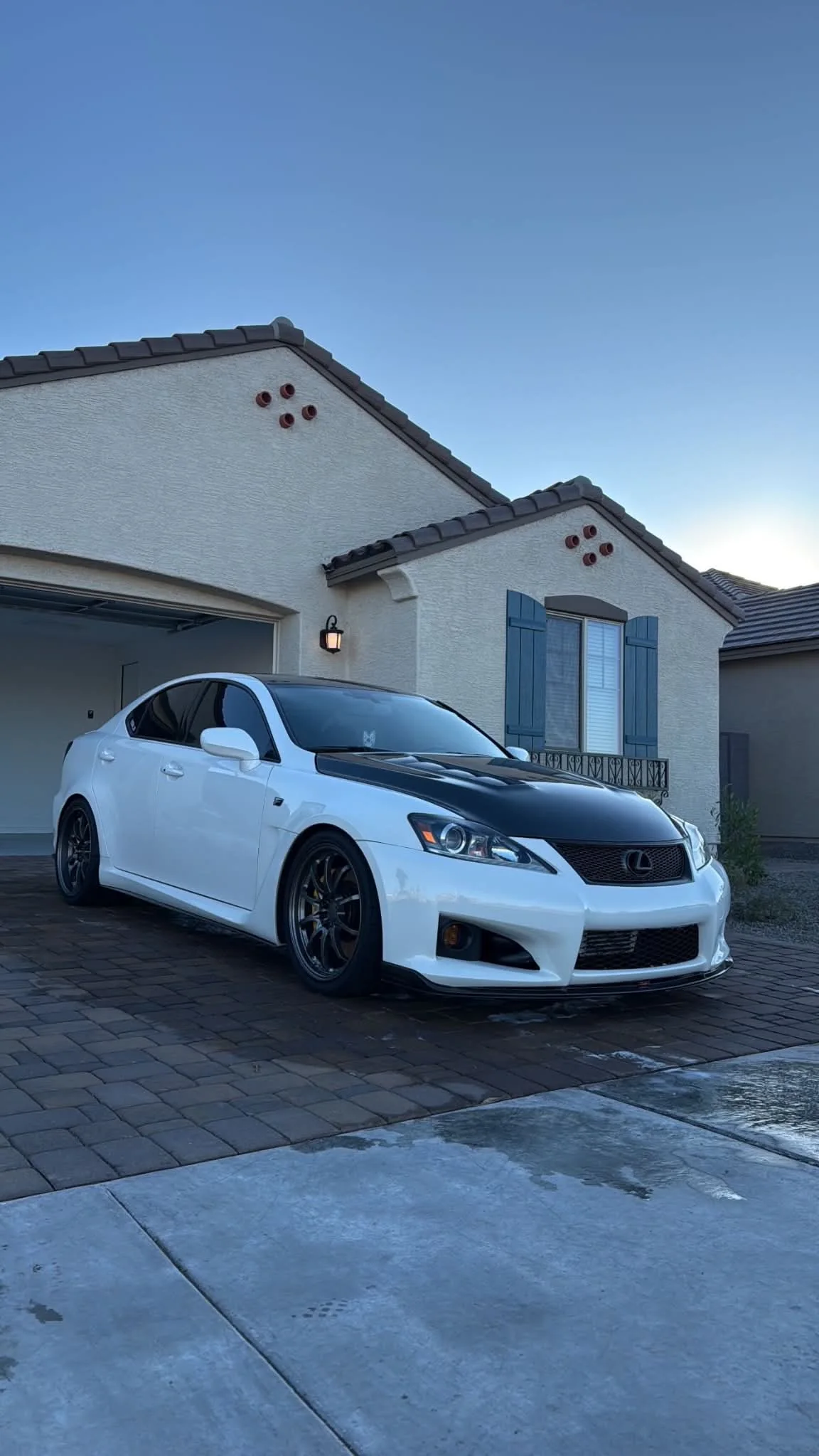 White Lexus IS F in a driveway