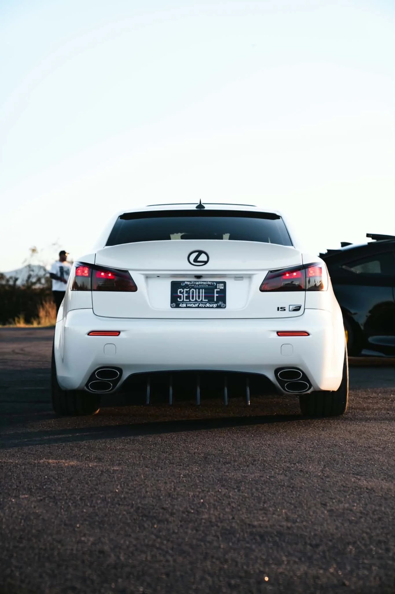 Rear view of white Lexus IS F with visual upgrades