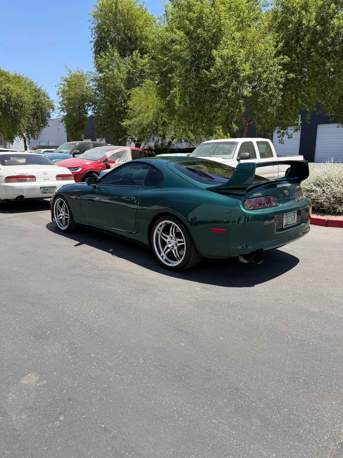 Green Toyota sports car side view